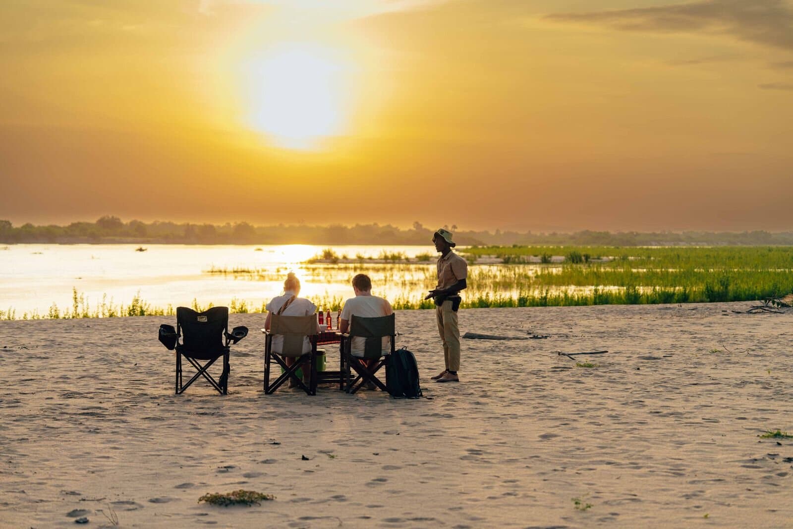 Sundowner drinks on the water, Okavango Delta