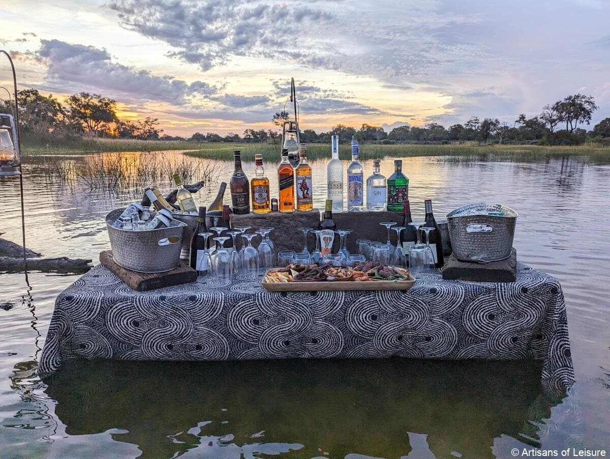 Romantic sunset water cruise with sundowners in the Okavango Delta, Botswana