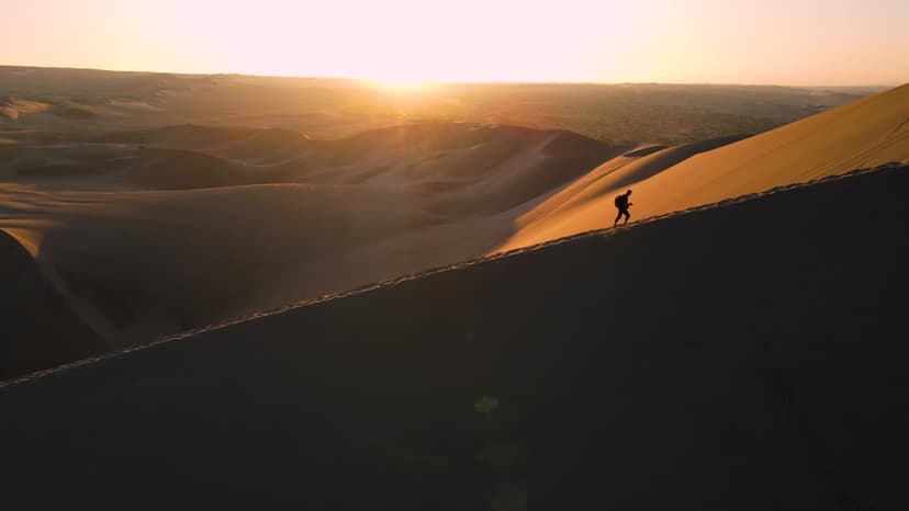 Sandboarding the desert slopes near Swakopmund, Namibia