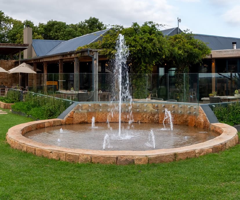 Courtyard and fountain at Botlierskop Village lodge on the Garden Route