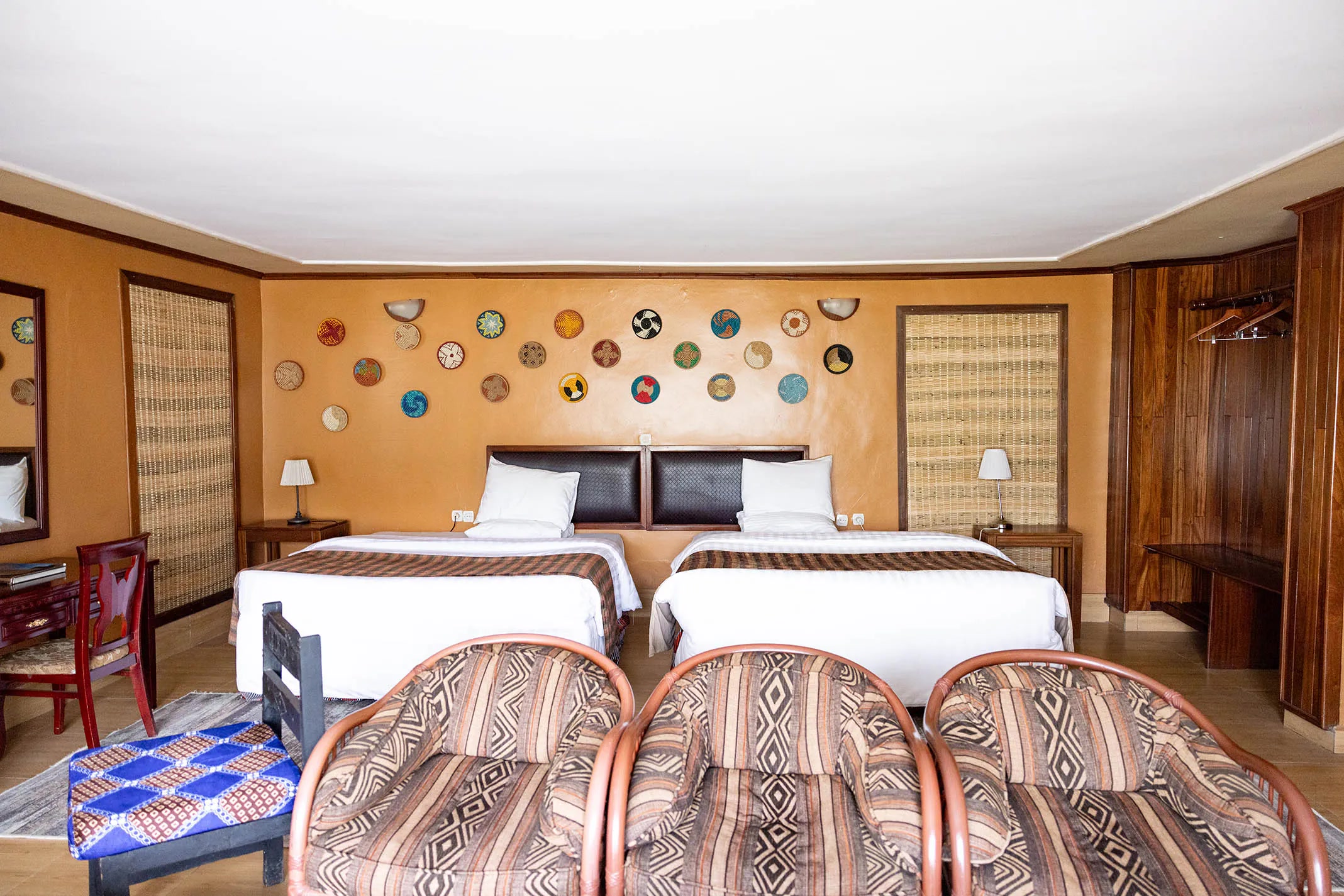 Room interior with fireplace at Mountain Gorilla View Lodge