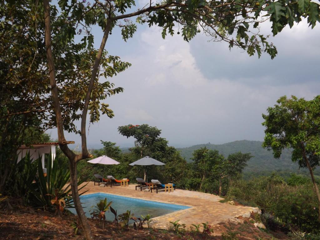 Cottage at Isunga Lodge with forest and mountain views