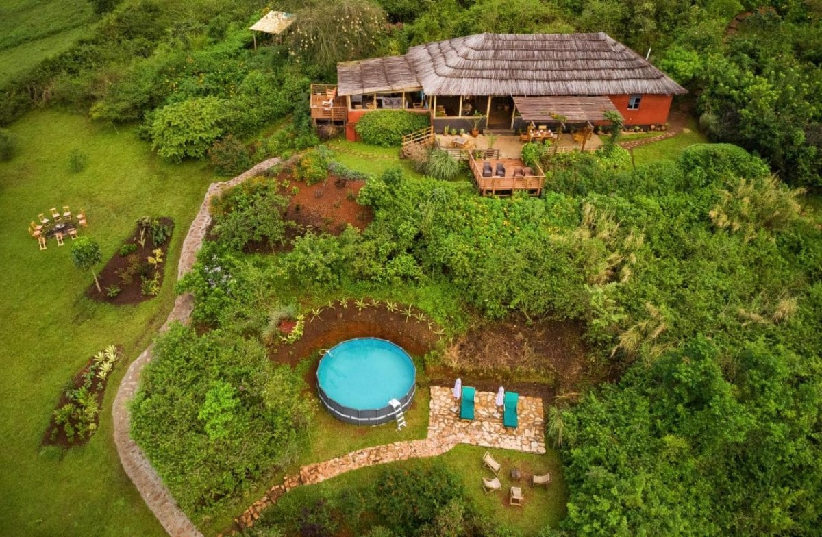 Swimming pool and grounds at Isunga Lodge Kibale
