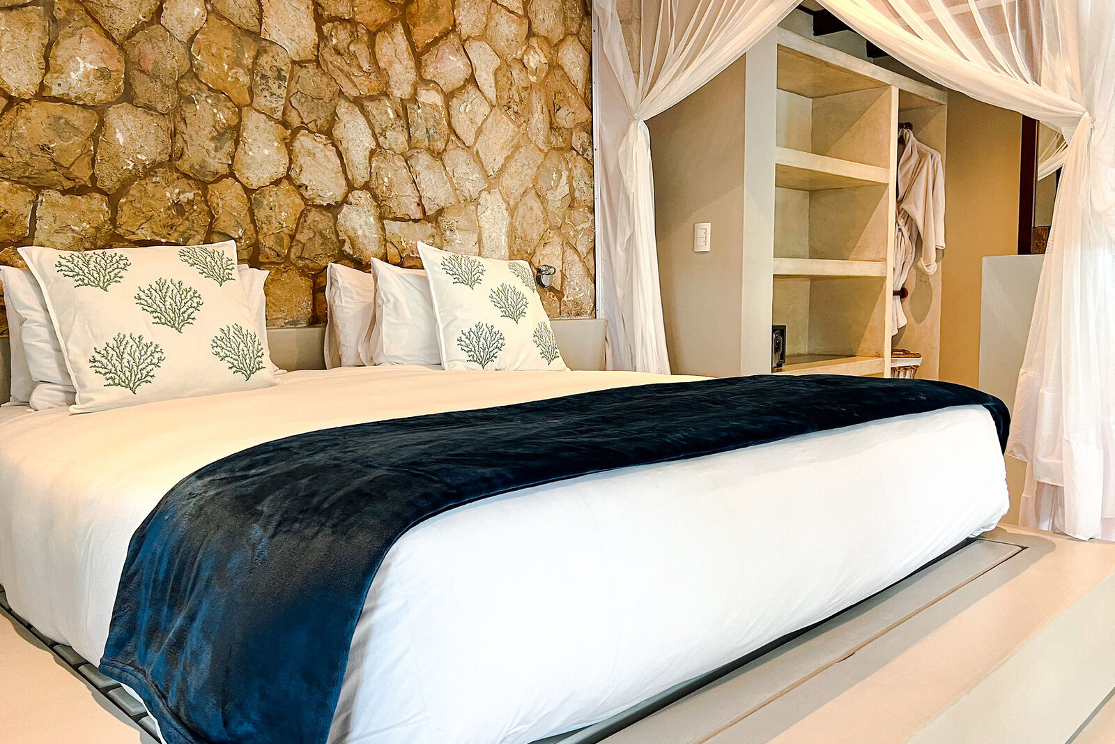 Sea-view bedroom at Bahia Mar Club with private veranda overlooking the Bazaruto Archipelago