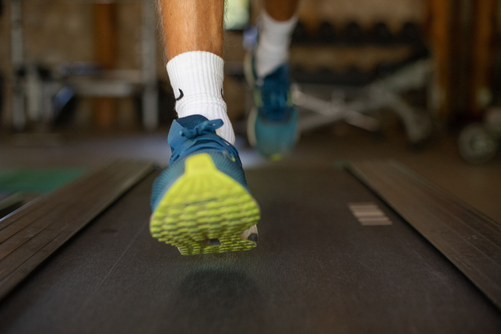 State-of-the-art gym at Bahia Mar Club, Vilanculos — Queenax functional training stations, cardio equipment, and ocean-view fitness space
