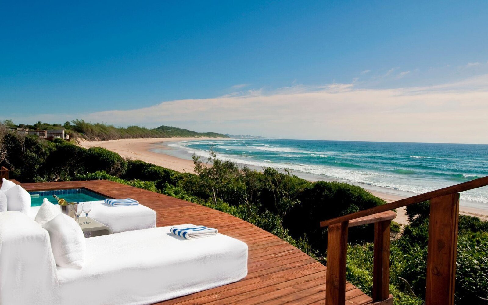 A private plunge pool overlooking a tropical ocean at a beach resort