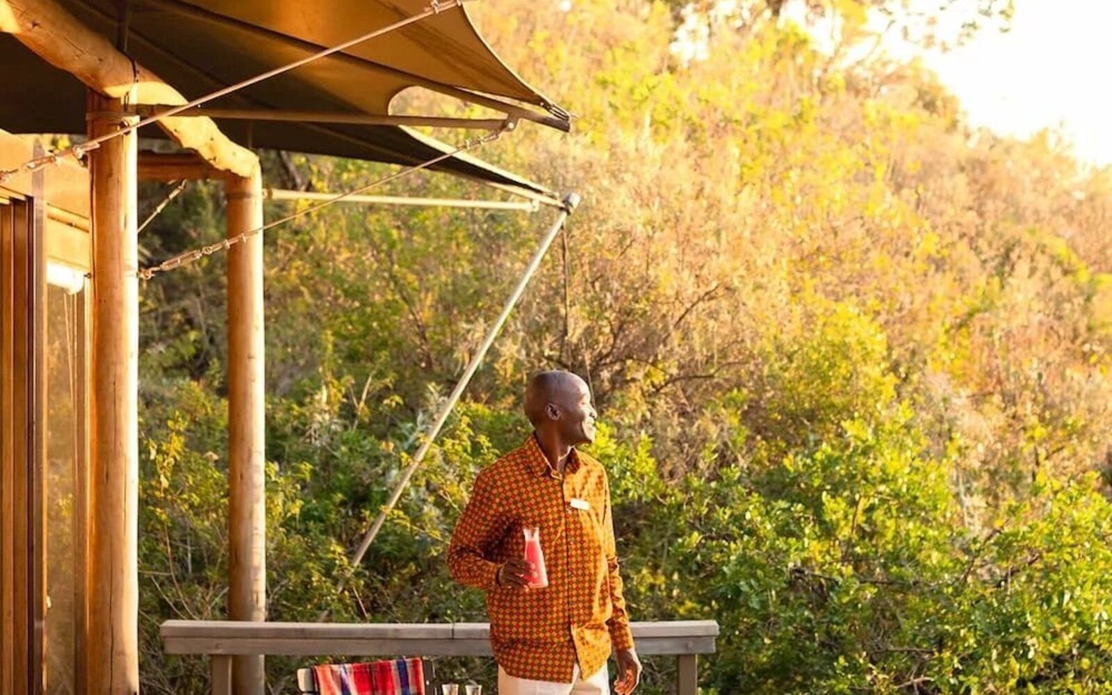 A private dining deck with a view over the Masai Mara at Angama Mara