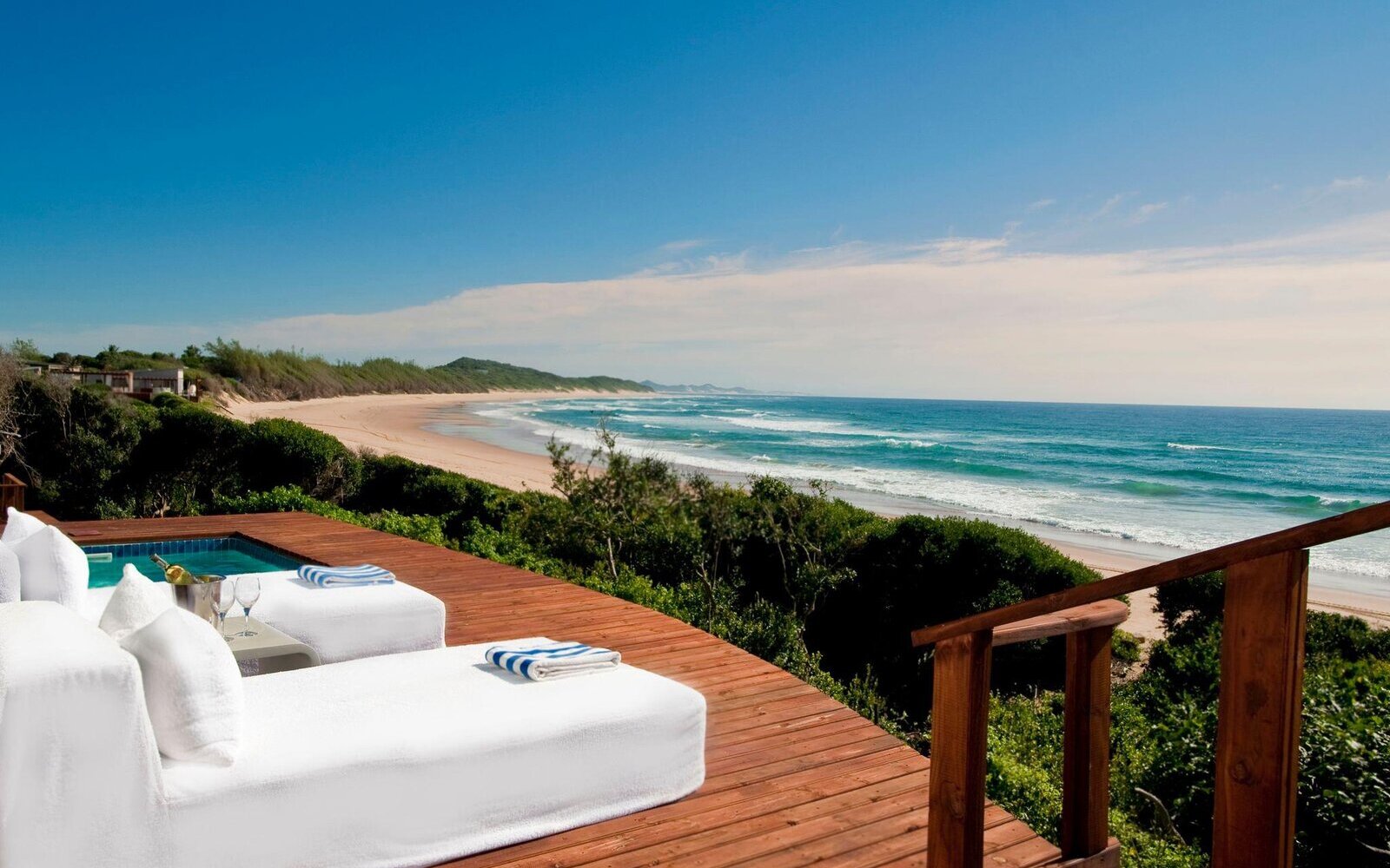 A private suite deck and plunge pool overlooking the ocean and forest coast at White Pearl, southern Mozambique