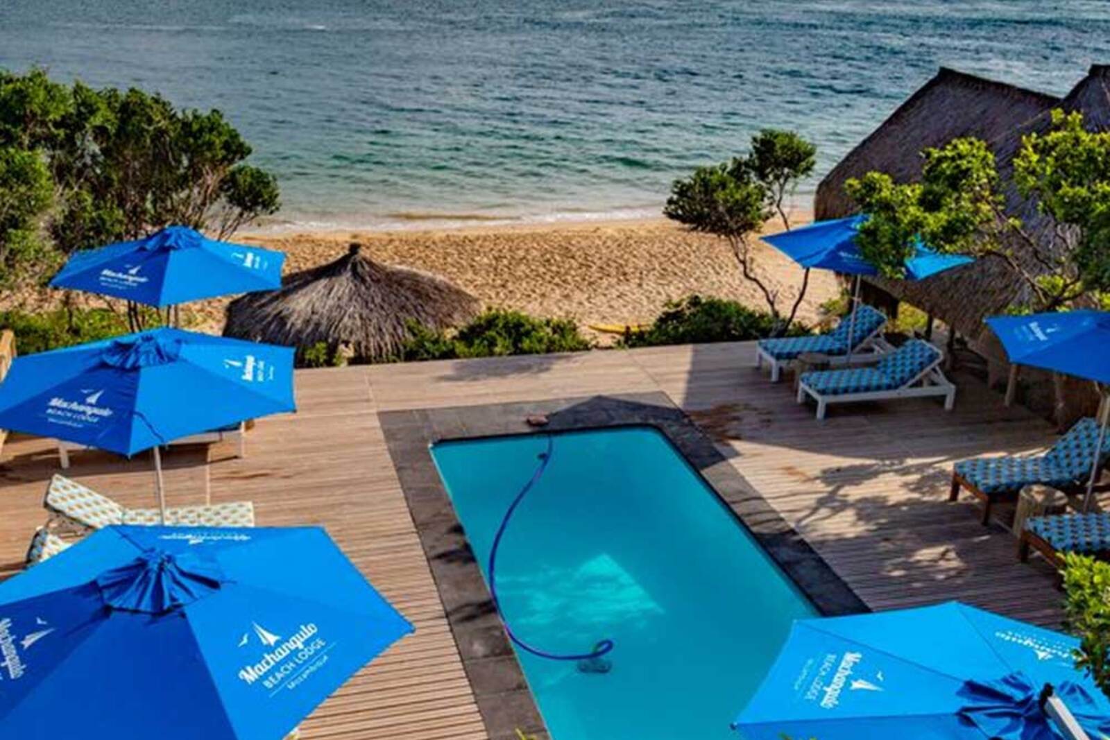 Machangulo Beach Lodge — pool deck and loungers
