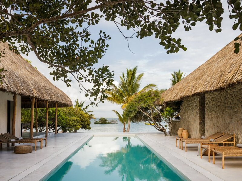 Sussurro — beachfront pool and loungers