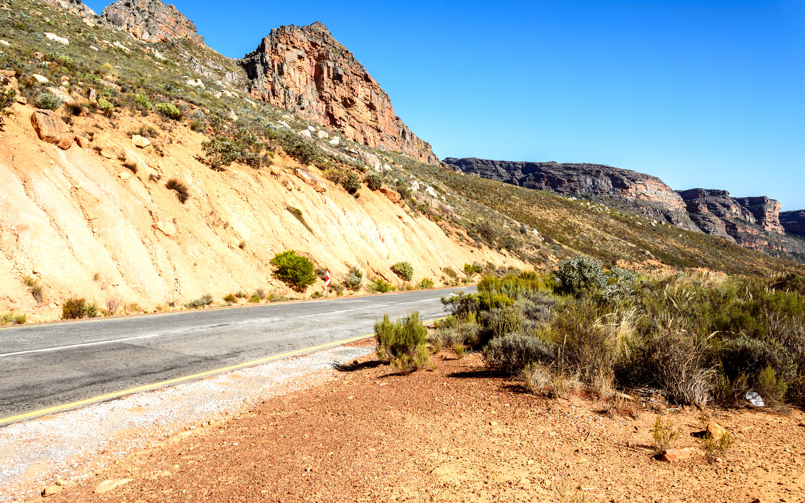 Wind-carved Cederberg sandstone formations under a warm Western Cape sky