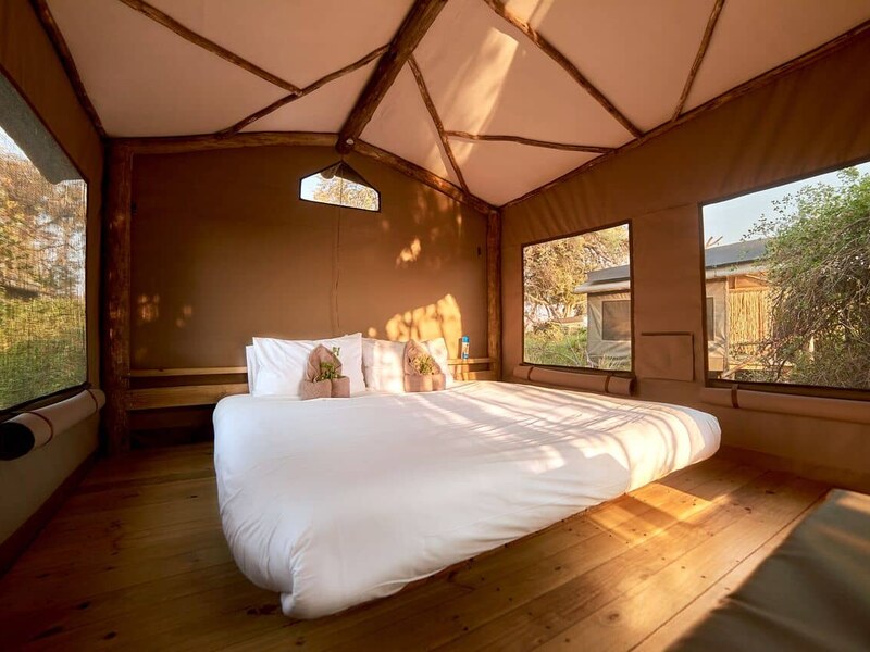 Inside an Oddballs Camp dome tent with a comfortable double bed and floodplain views