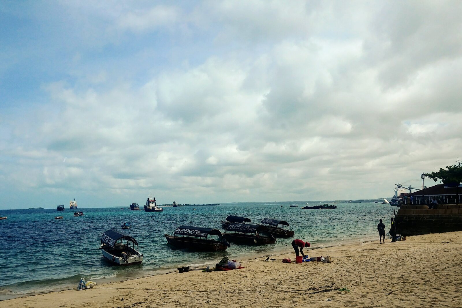 Fishing and tourist boats on a Zanzibar beach