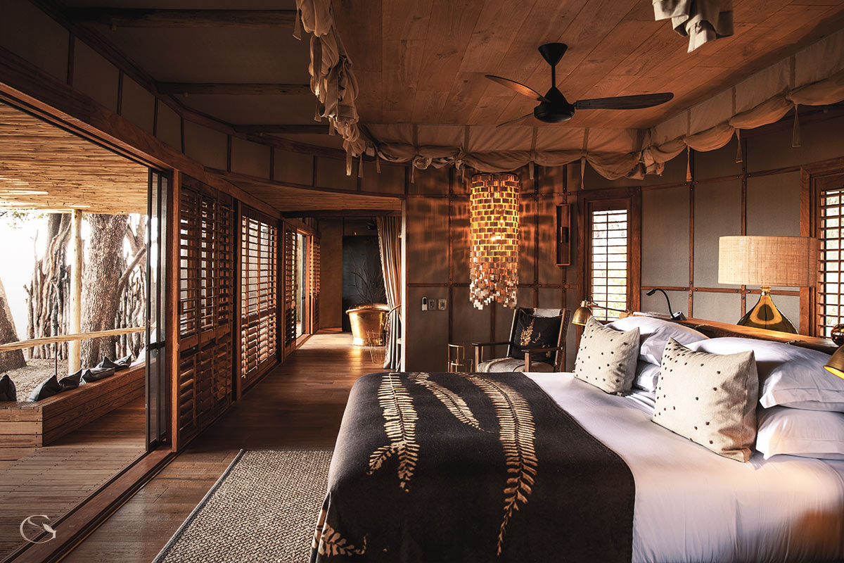The raised exterior and walkways of Mombo Camp overlooking the Okavango floodplain