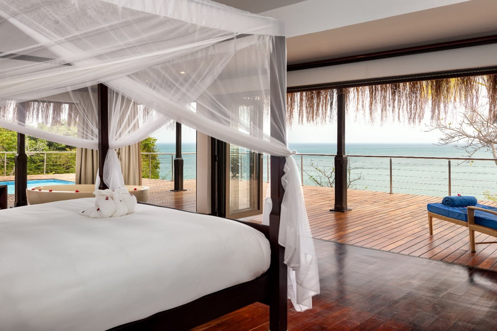 A sea-view pool villa bedroom at Anantara Bazaruto opening to the Indian Ocean, Bazaruto Island, Mozambique