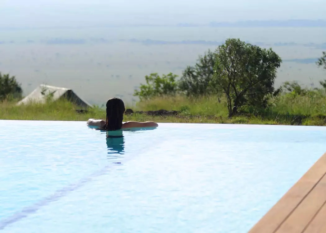 Angama Mara infinity pool overlooking Masai Mara Triangle Kenya safari lodge