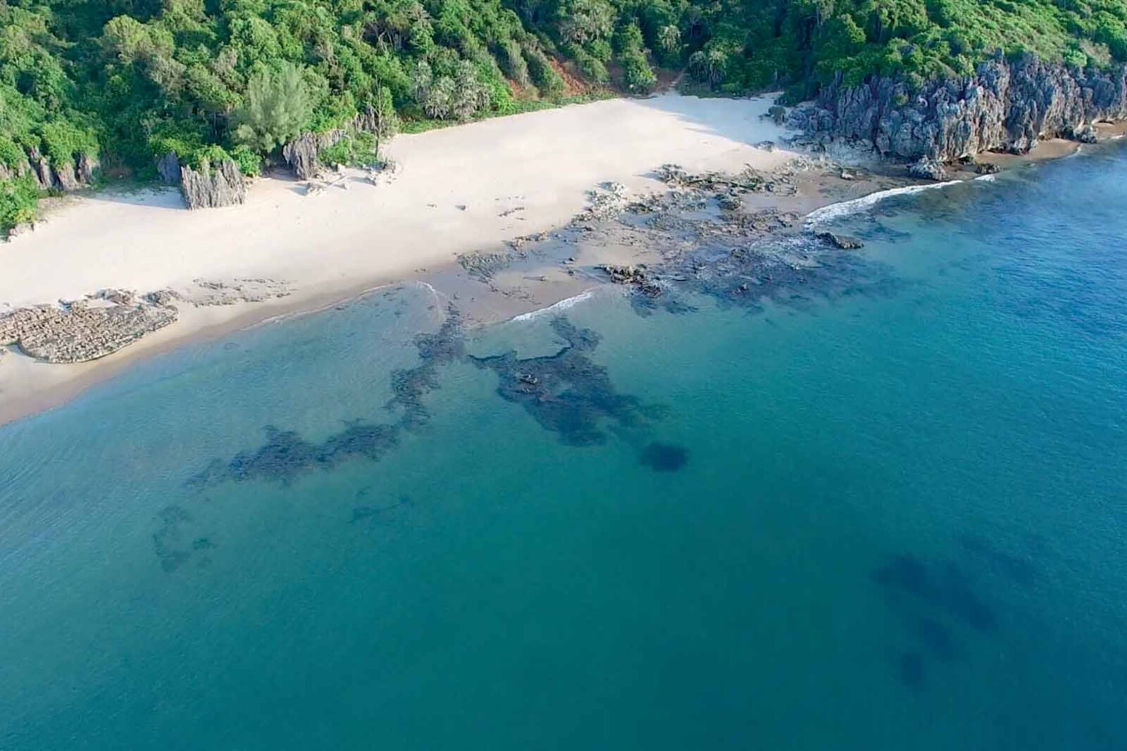 A hidden white-sand cove and turquoise water on the Anjajavy peninsula, north-west Madagascar