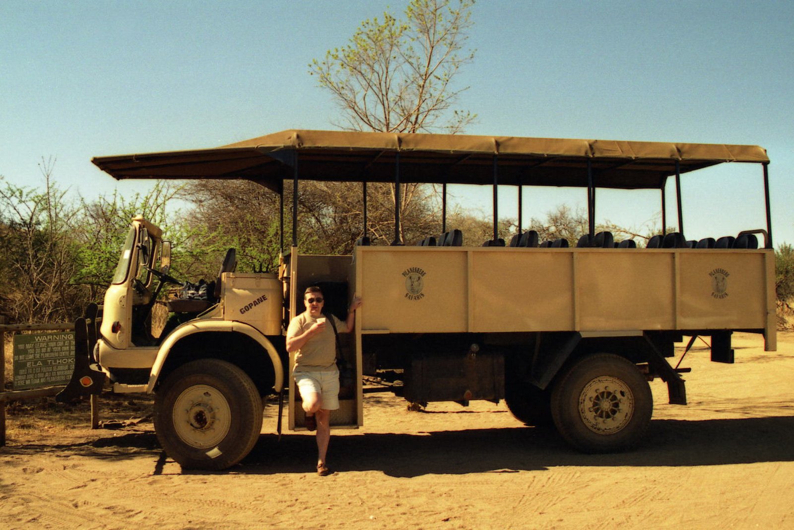 Open safari vehicle on a morning game drive in Madikwe Game Reserve