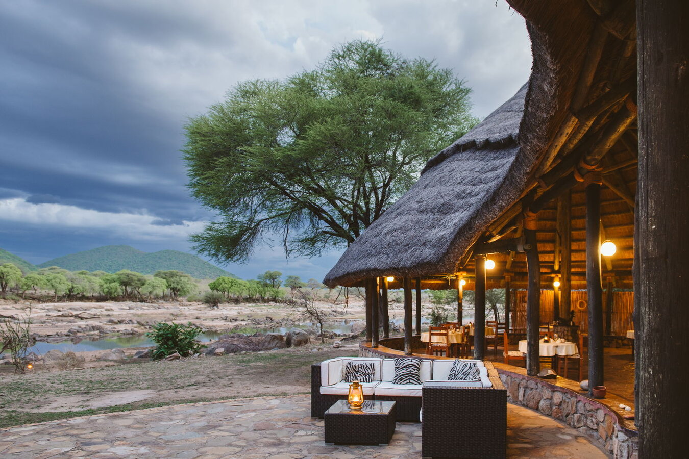 Ruaha River Lodge riverside lounge and bar under thatch on the Great Ruaha River