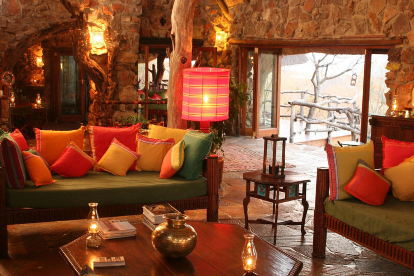 Warm, characterful lounge at Ant's Hill bush home overlooking the Waterberg escarpment