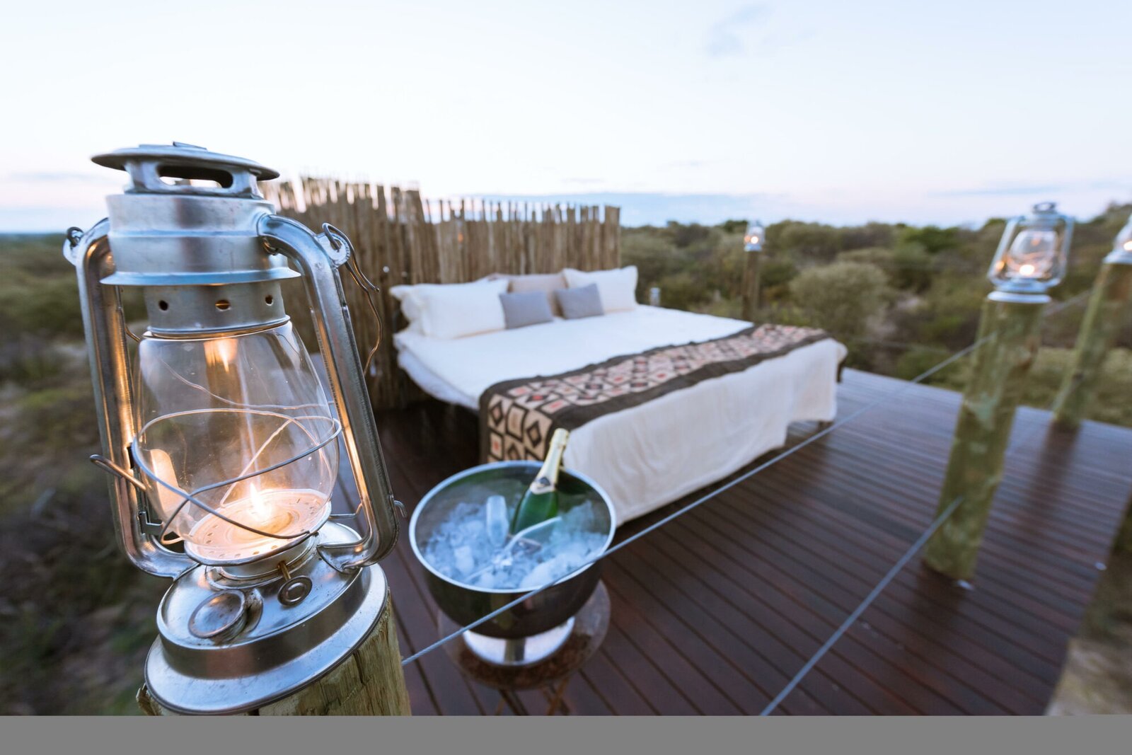 Guest room interior at Tau Pan Camp with a view across the Central Kalahari