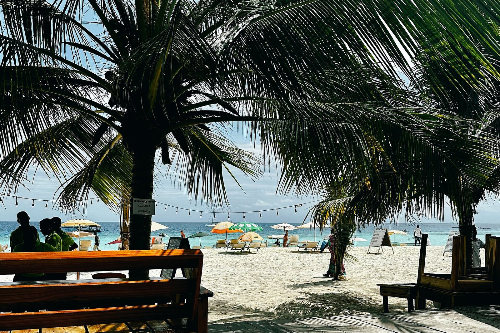 Palm-fringed white-sand beach in Zanzibar for a honeymoon