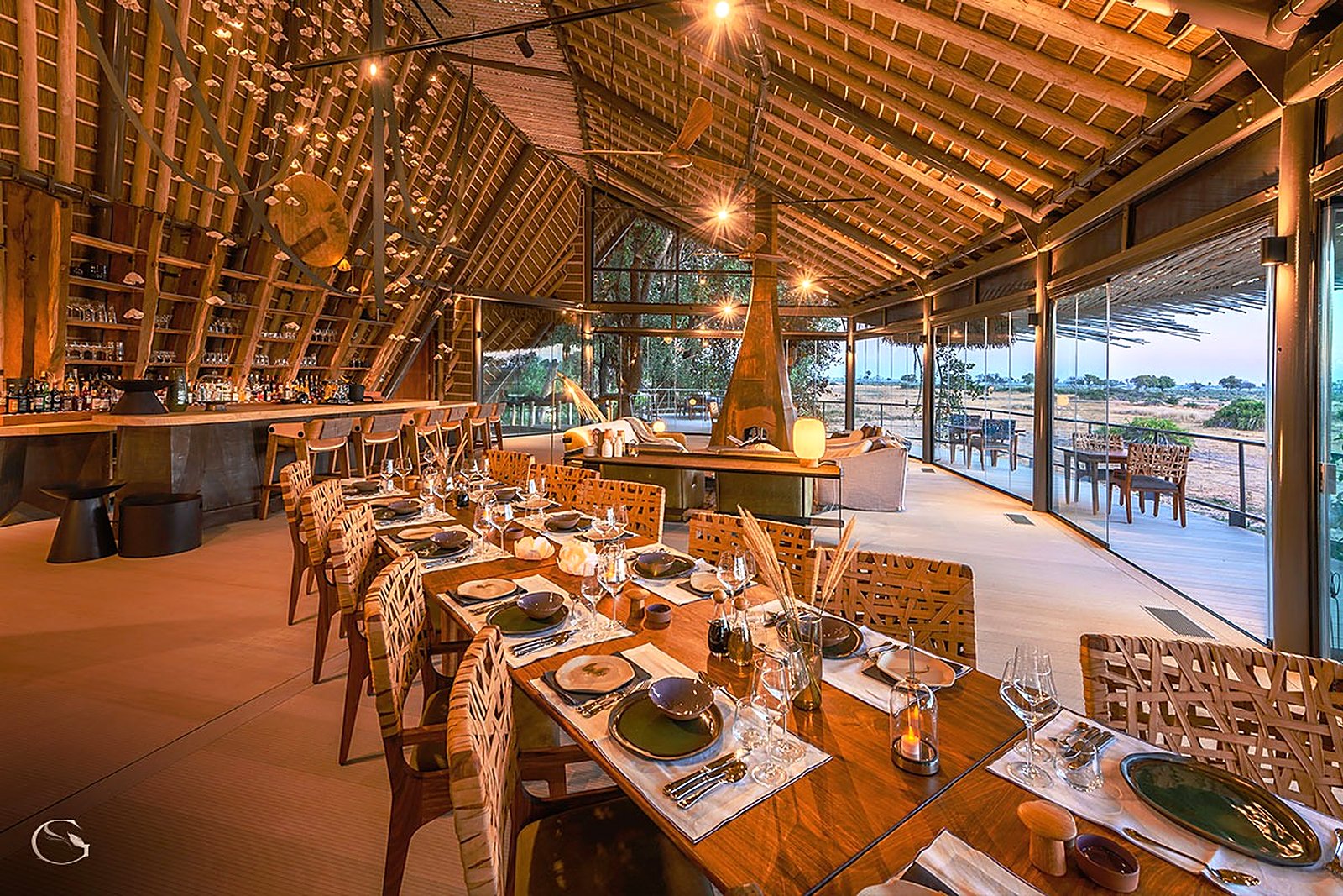 An elegant dining hall at a luxury Botswana safari camp