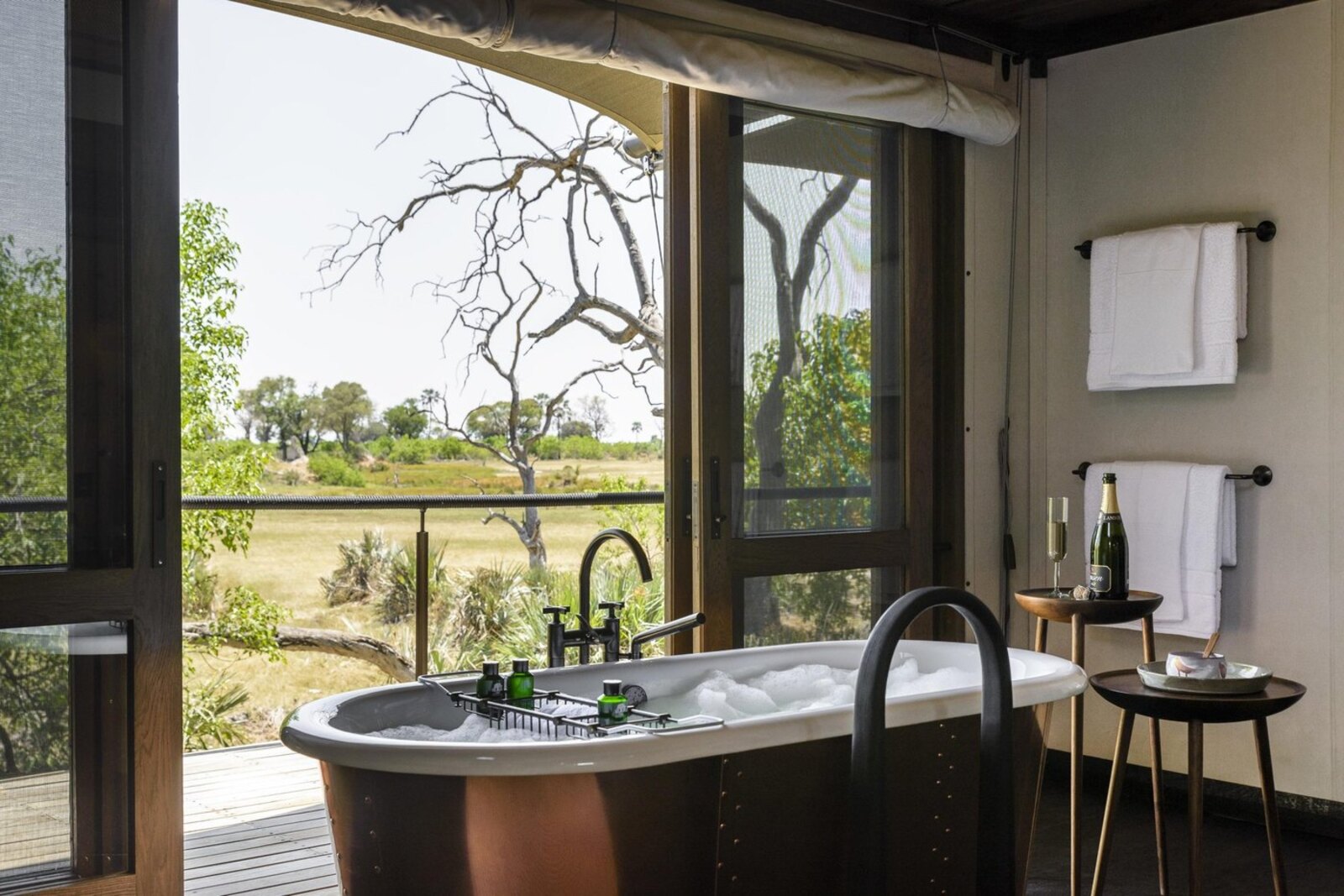 Xigera Safari Lodge — plunge pool and lounge area