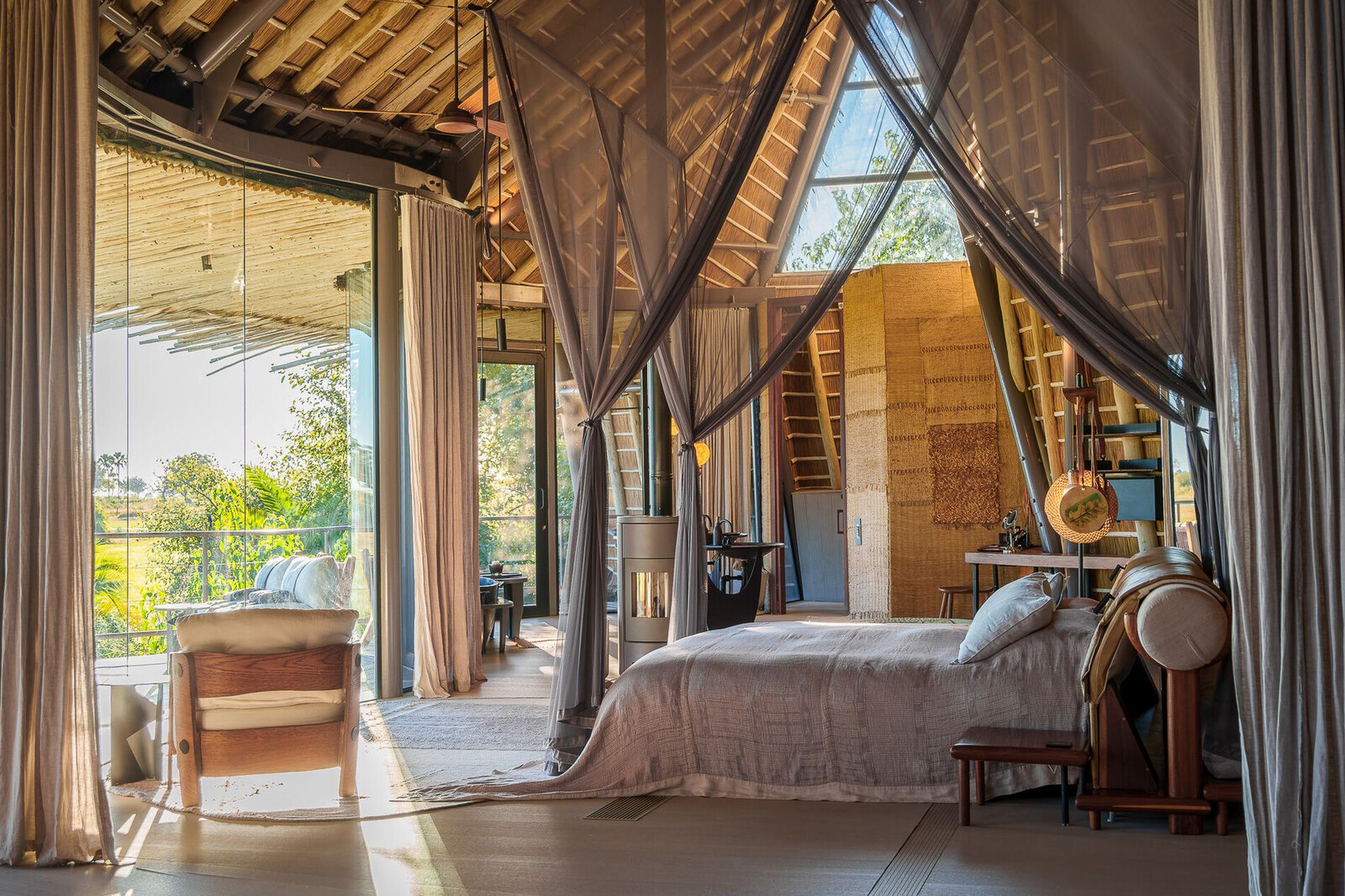 A thatched luxury suite with Delta views at Jao Camp in the Okavango