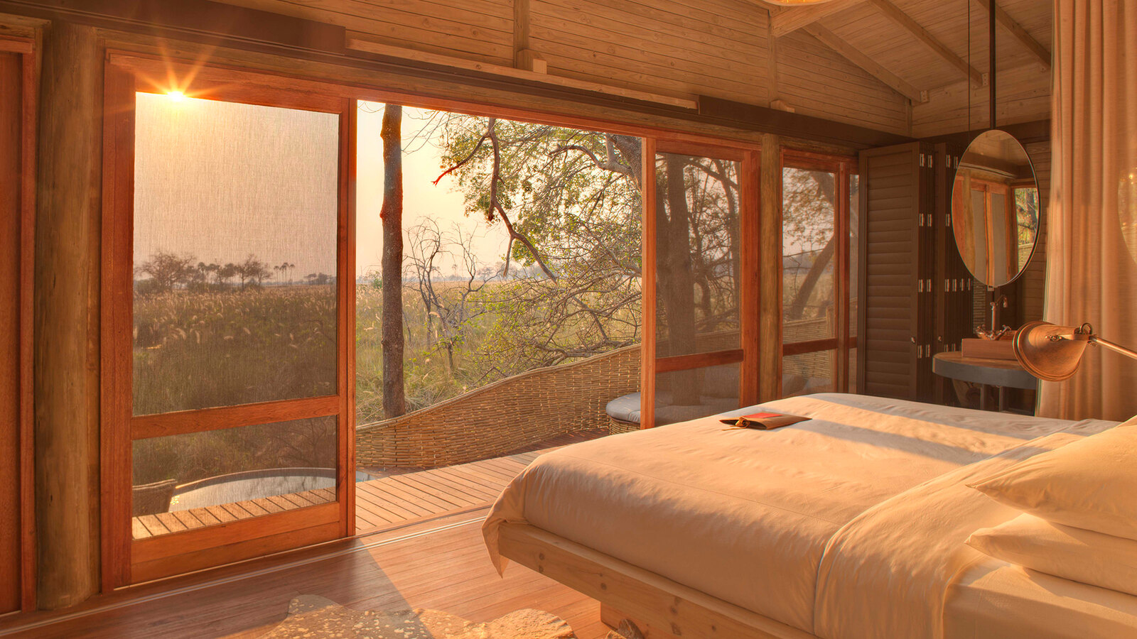A suite elevated above the floodplain at andBeyond Sandibe Okavango Safari Lodge