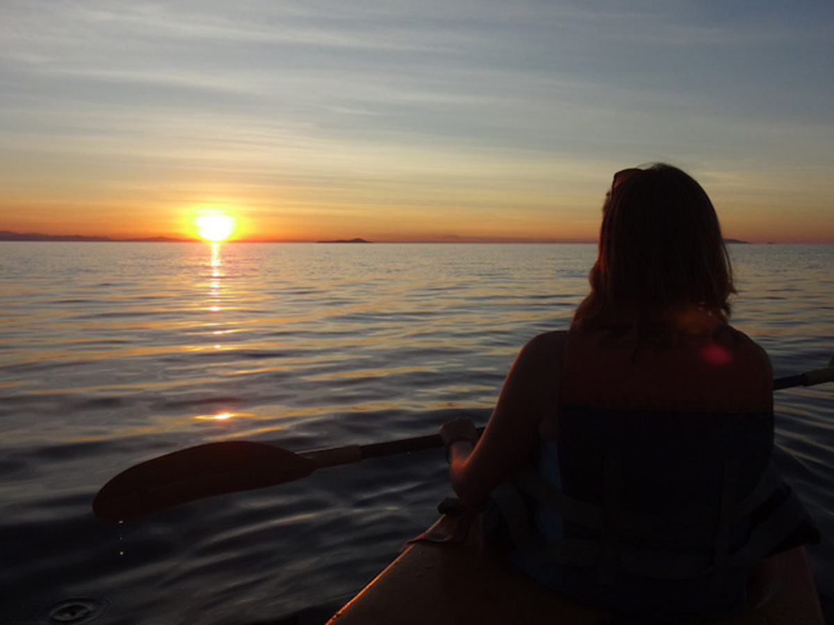 Sunset kayaking off Mumbo Island on Lake Malawi in the dry season