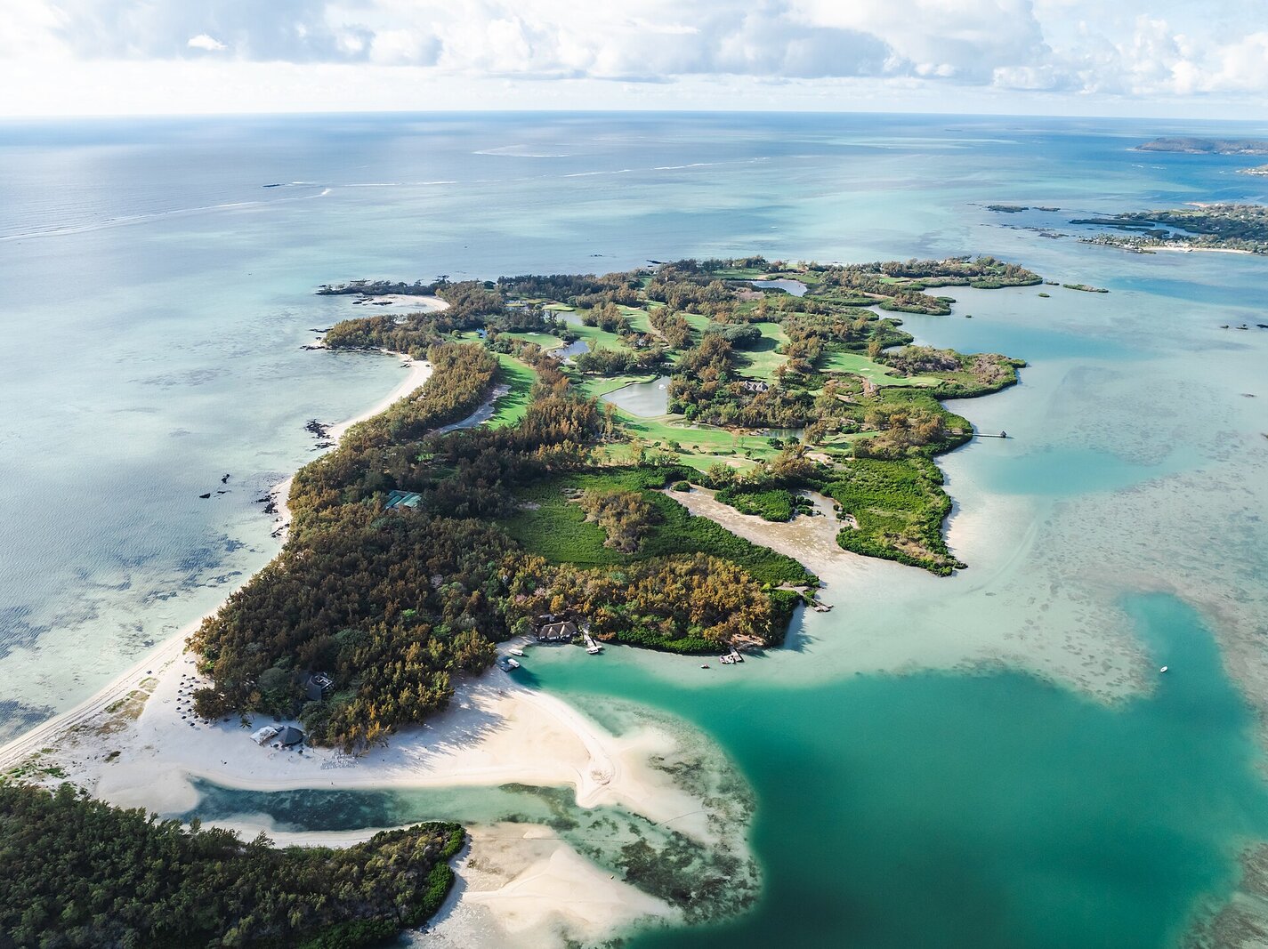 The white sand and clear water of Ile aux Cerfs island off the east coast of Mauritius