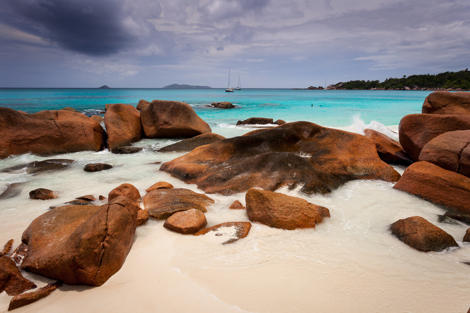 Pink granite boulders on a Seychelles beach