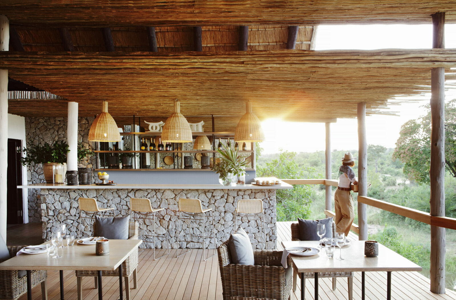 Open lodge deck with a view over the bush