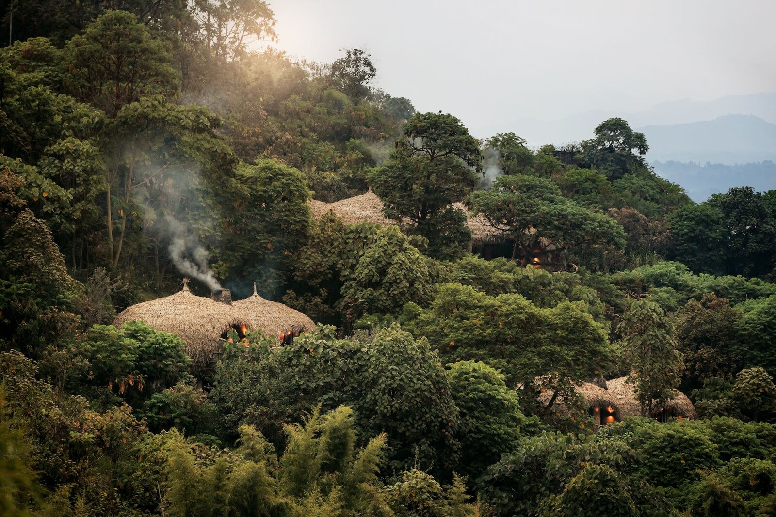 Bisate Lodge's nest-like forest villas nestled within the eroded volcanic amphitheatre in Rwanda