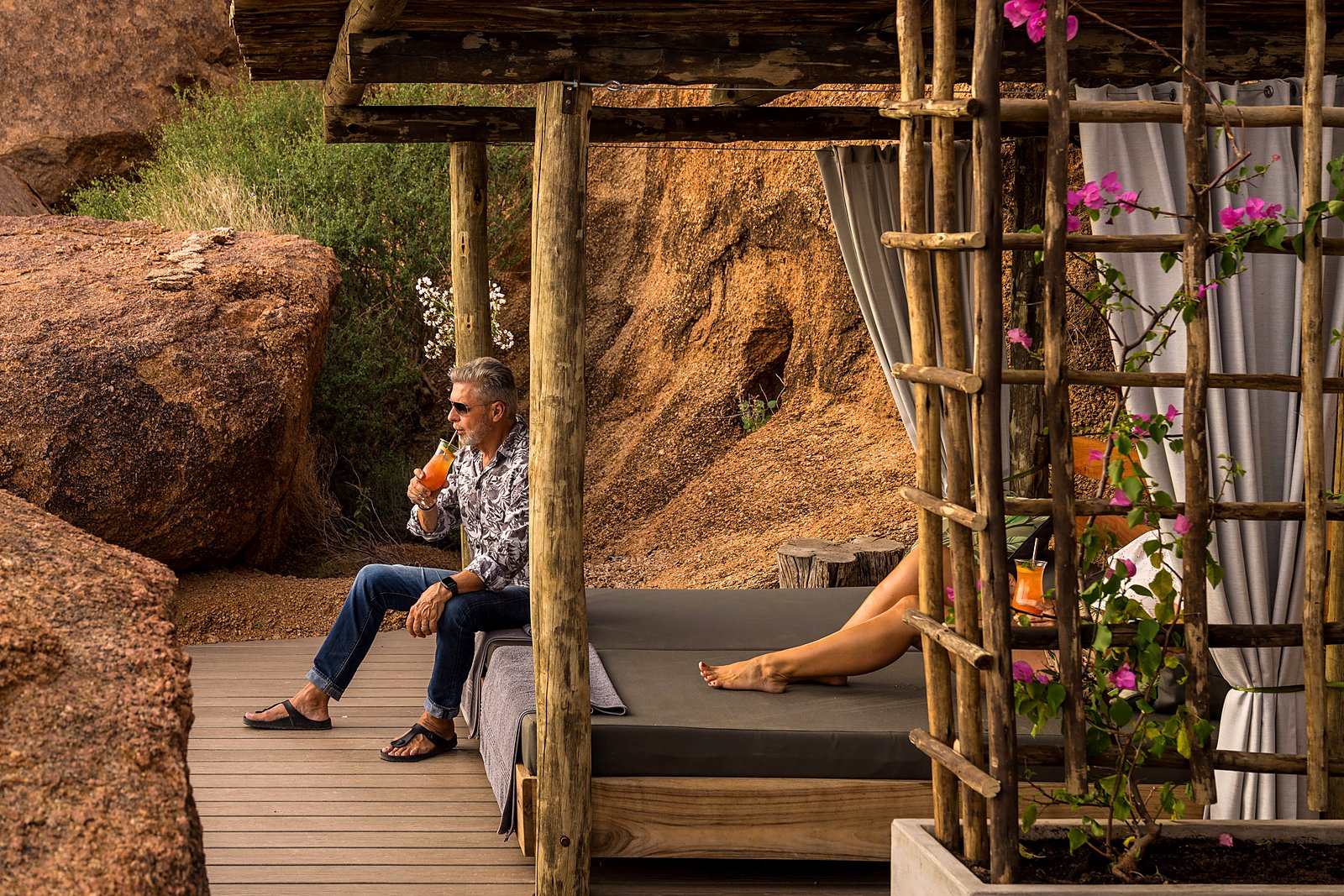 Domed adobe bungalows among granite boulders at Camp Kipwe, Damaraland