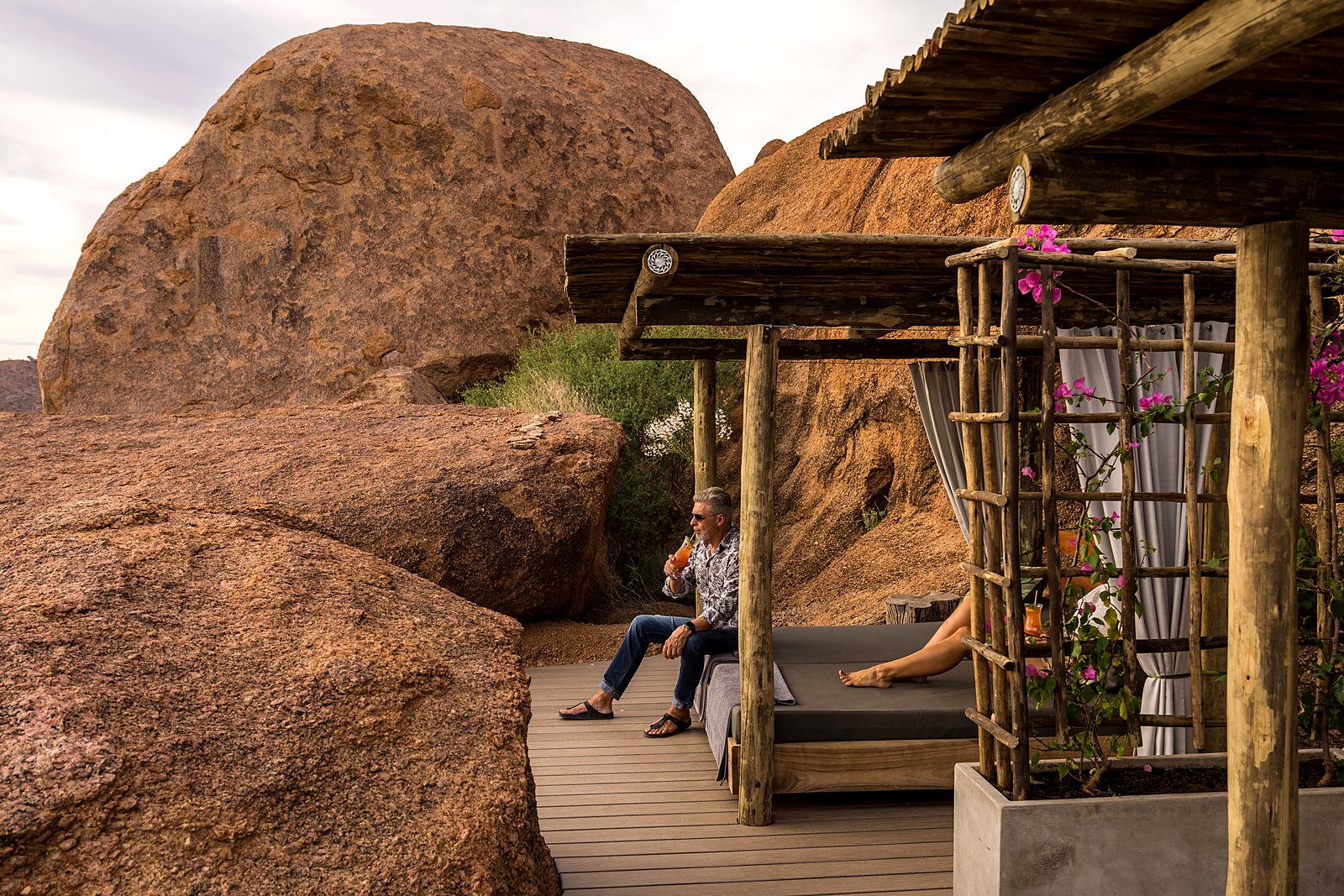 Rock pool and terrace surrounds overlooking the Damaraland valley at Camp Kipwe