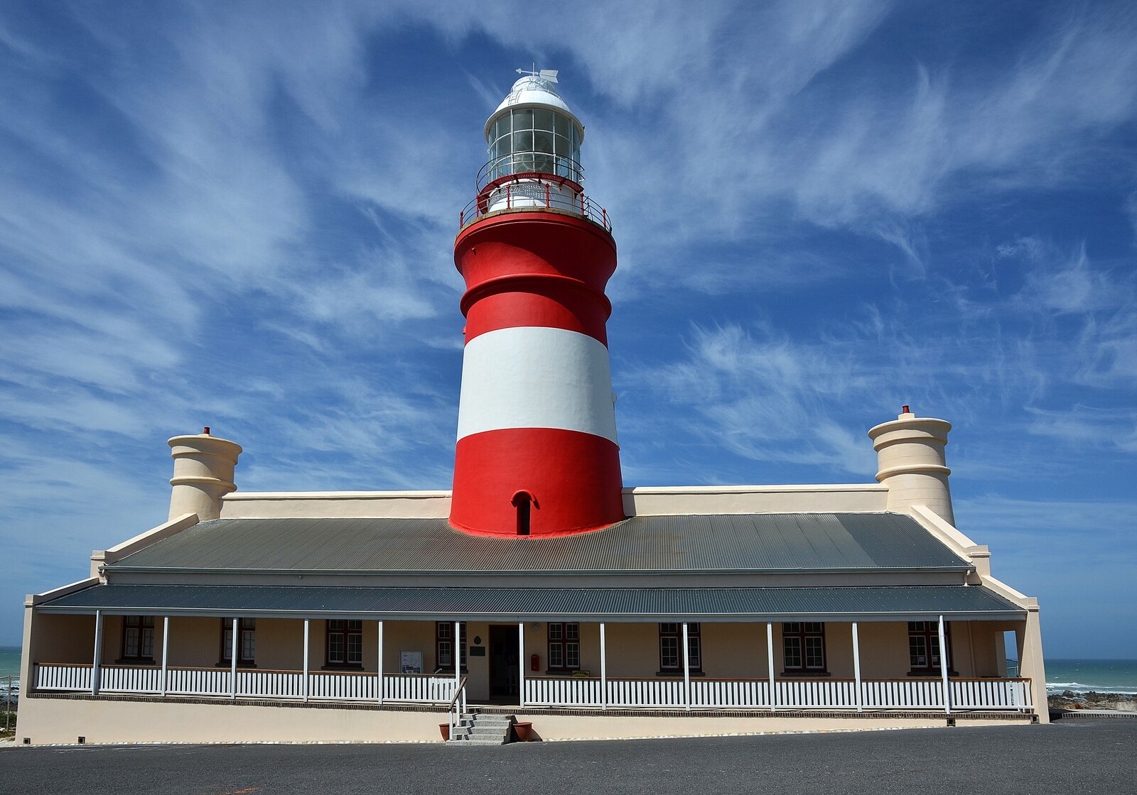 The Cape Agulhas Lighthouse and its keeper's cottage in golden light