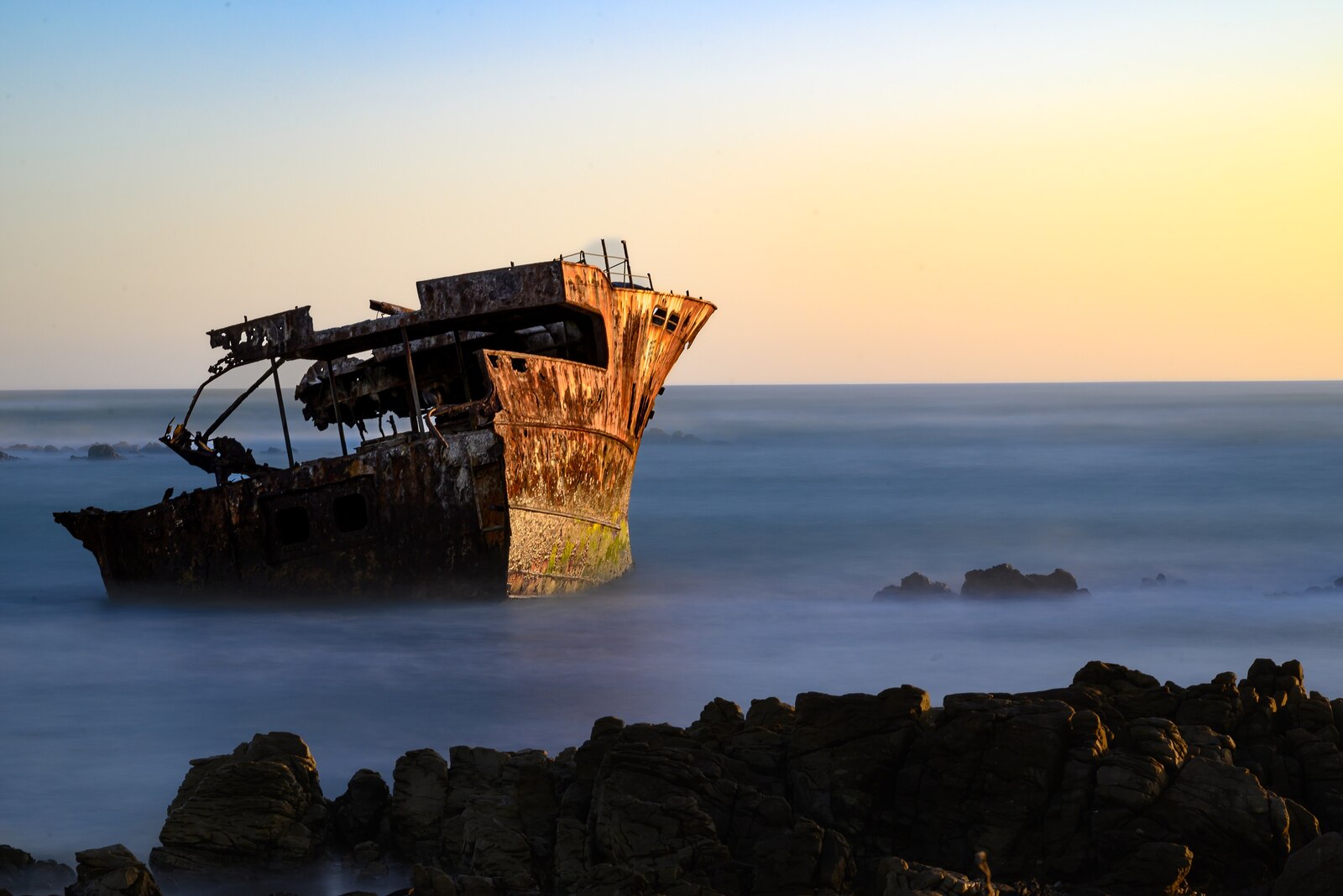 The Meisho Maru wreck silhouetted at sunset on the Agulhas coast