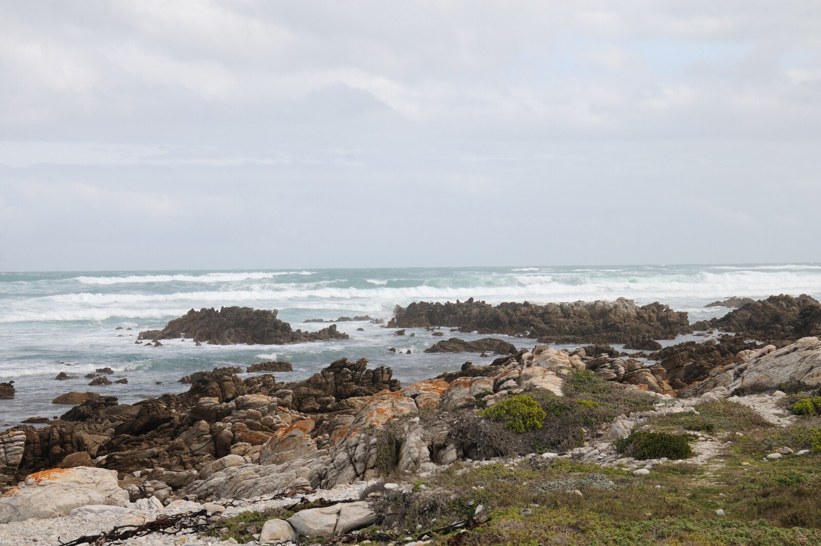 The wild low rocky coastline at Cape Agulhas