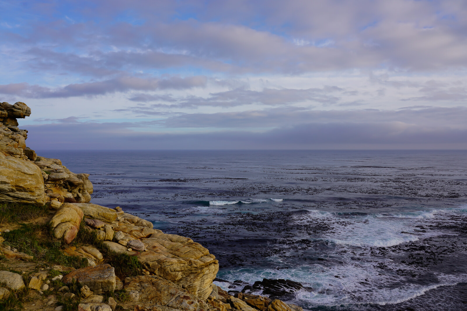 The wave-battered rocky shore below the Cape of Good Hope