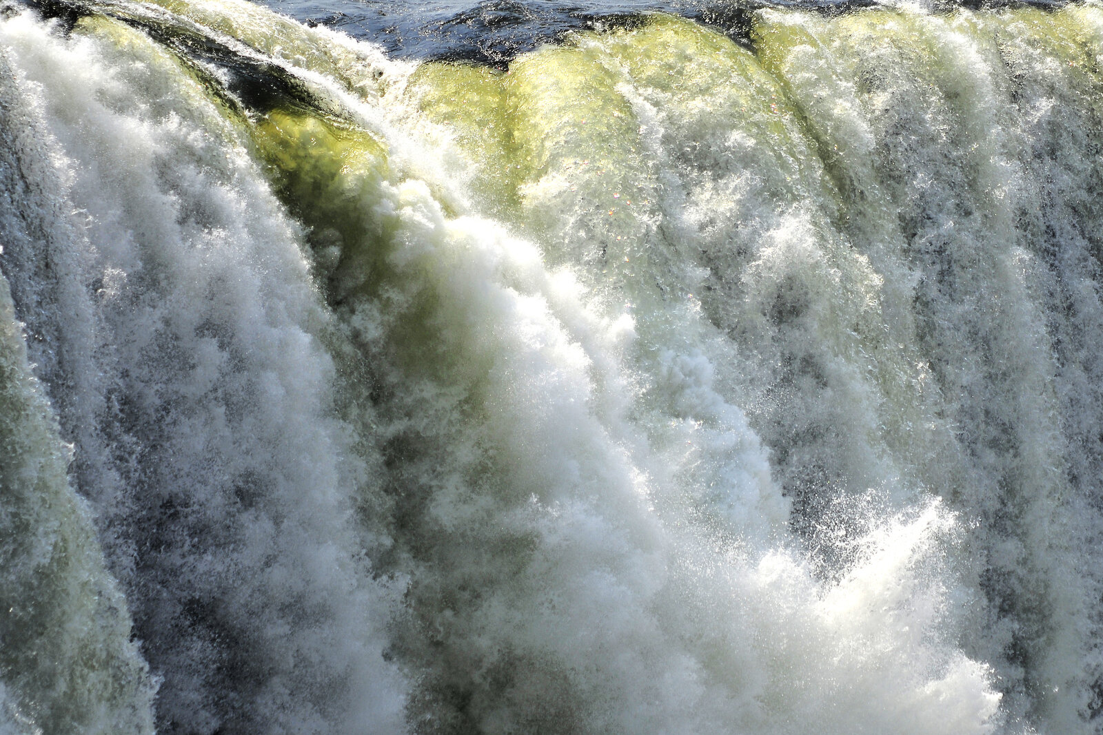 The main cataract of Victoria Falls in full flow with clouds of spray