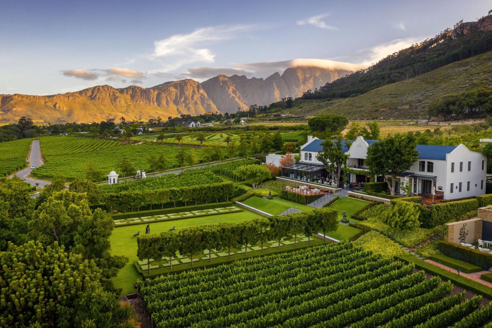 Elegant boutique wine estate manor house among gardens and vineyards