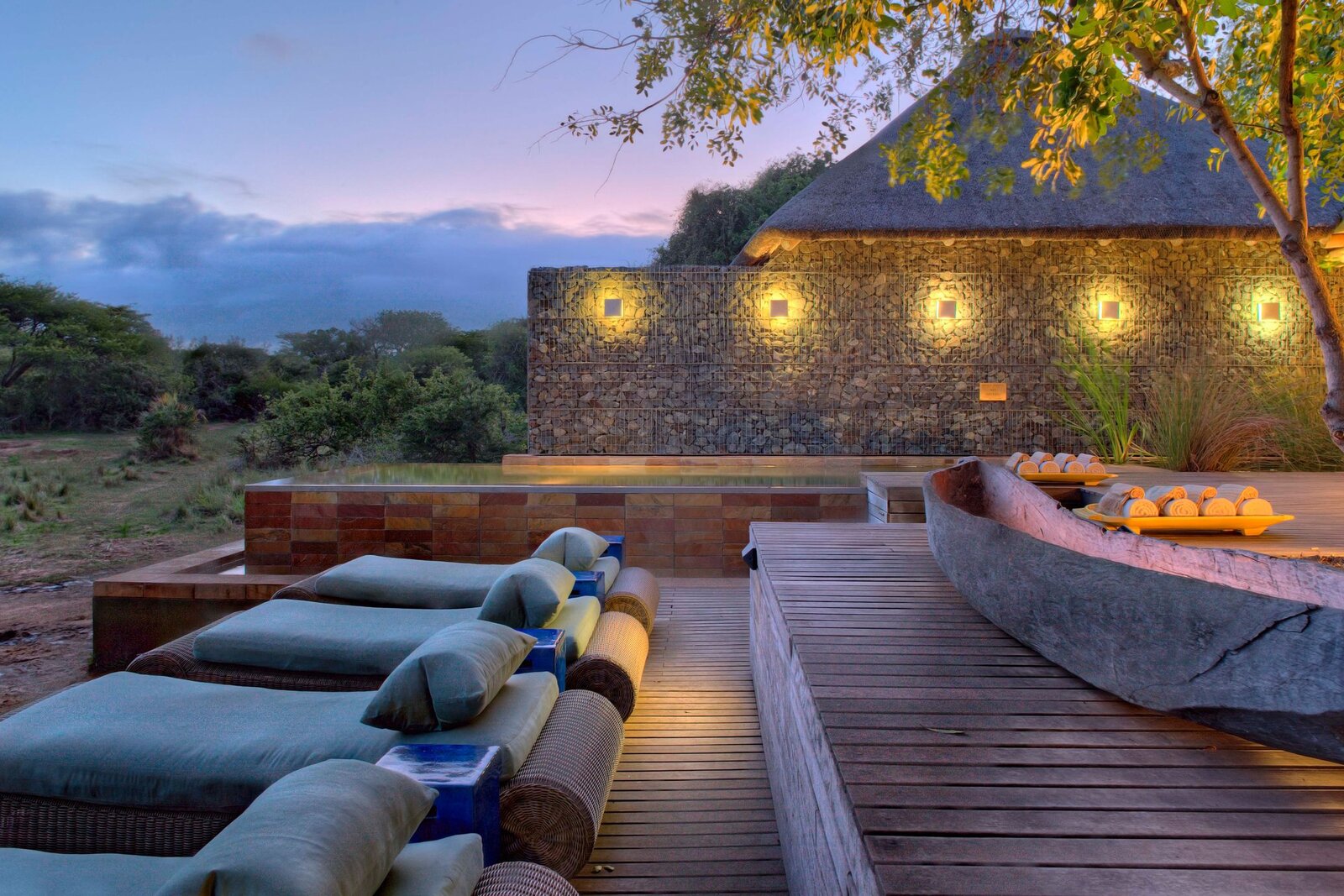 An exclusive-use safari villa with a pool deck reserved entirely for one company group
