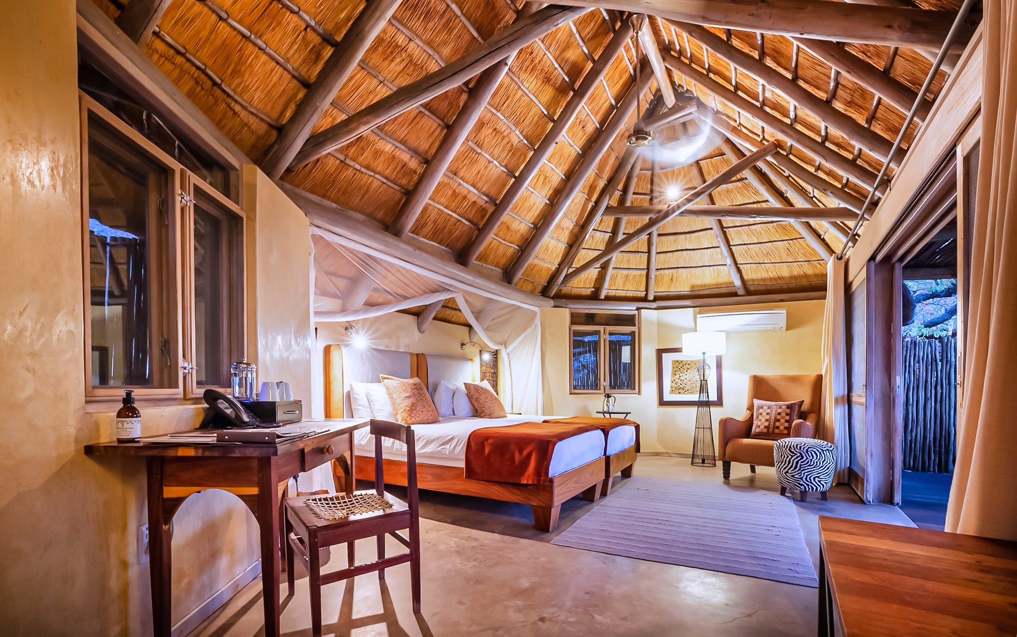 A family-friendly safari lodge with a waterhole in Namibia