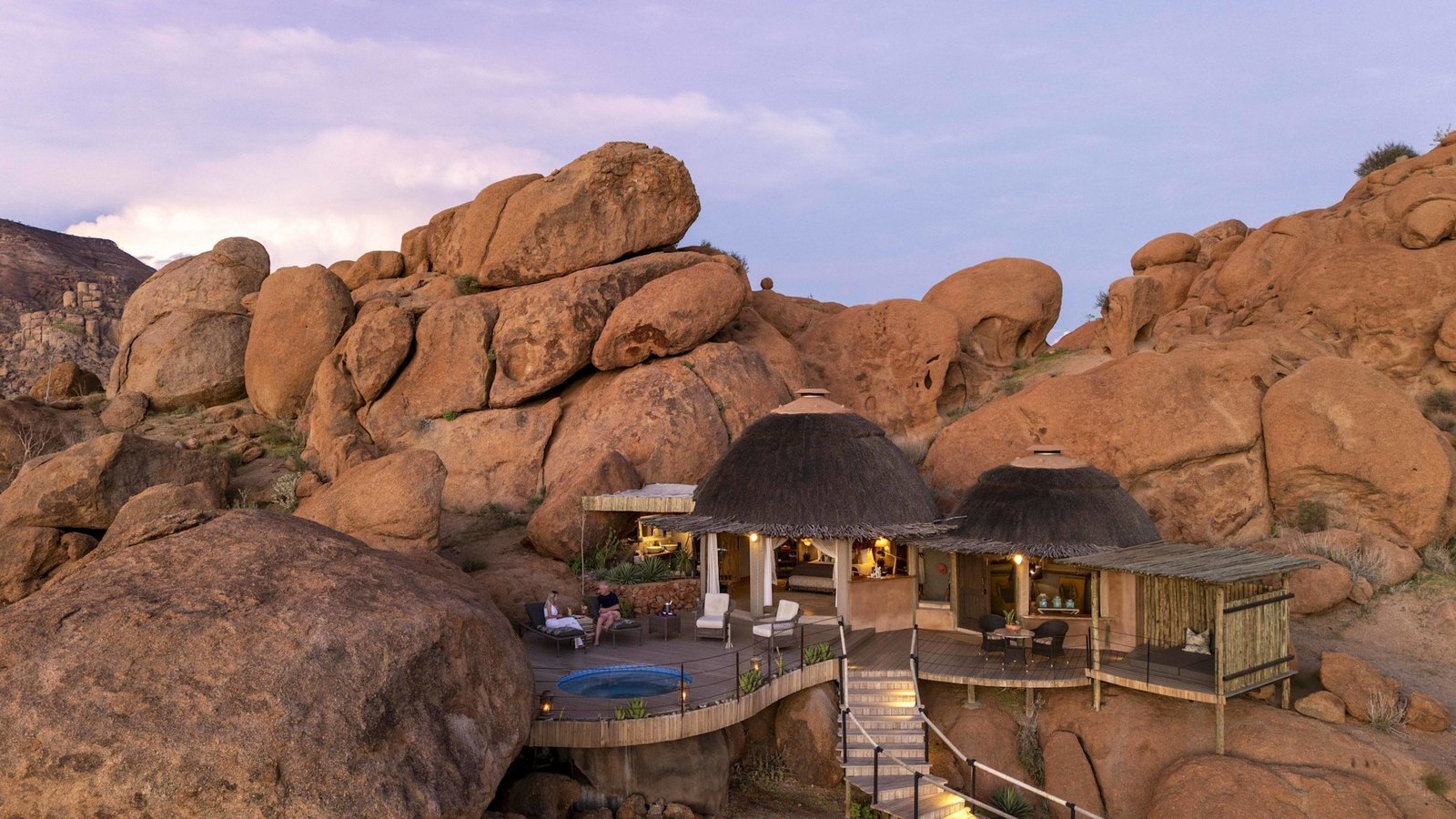 Camp Kipwe stone and canvas suite set among Damaraland boulders