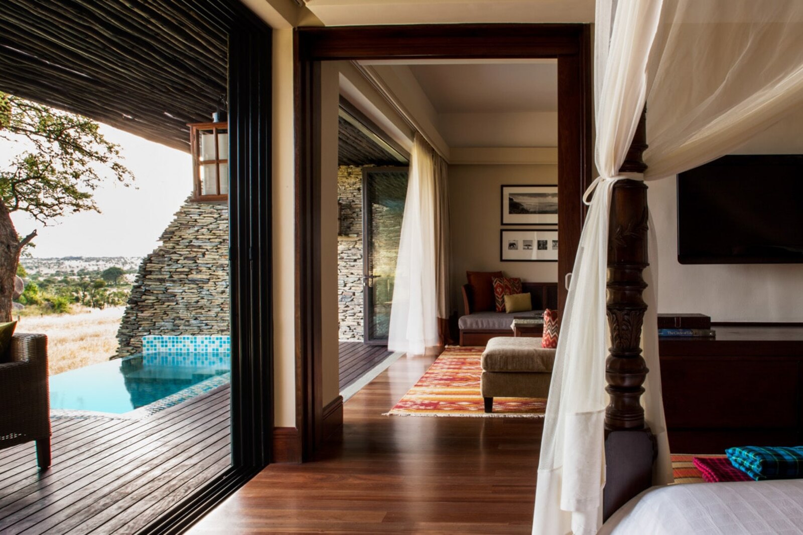 Four Seasons Safari Lodge Serengeti suite with private plunge pool opening to the savanna
