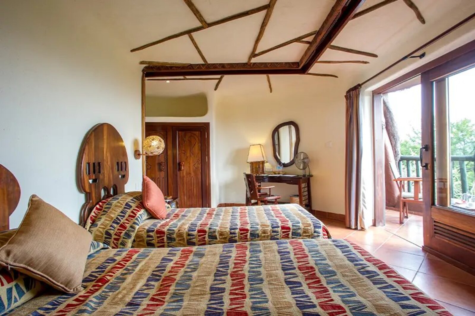 Ngorongoro Serena Safari Lodge room opening to views over the crater highlands