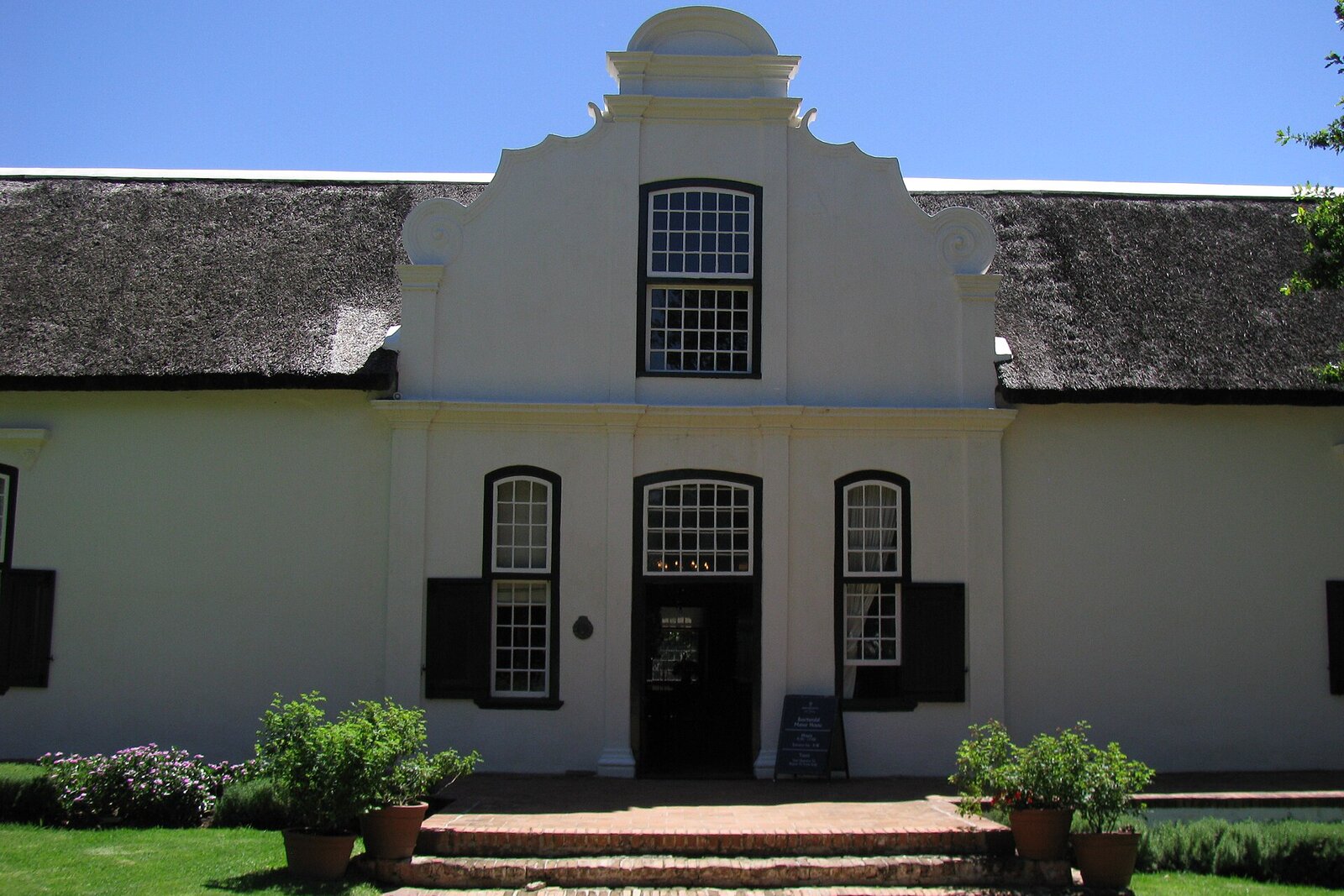The charming main street of Franschhoek village with galleries and cafes