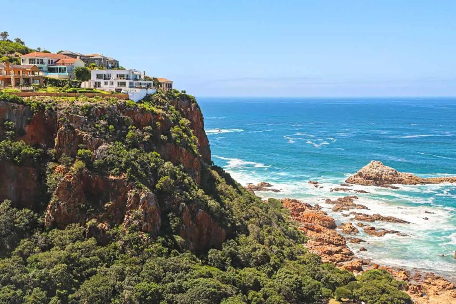 The rugged coastline and forested cliffs of the Garden Route near Knysna